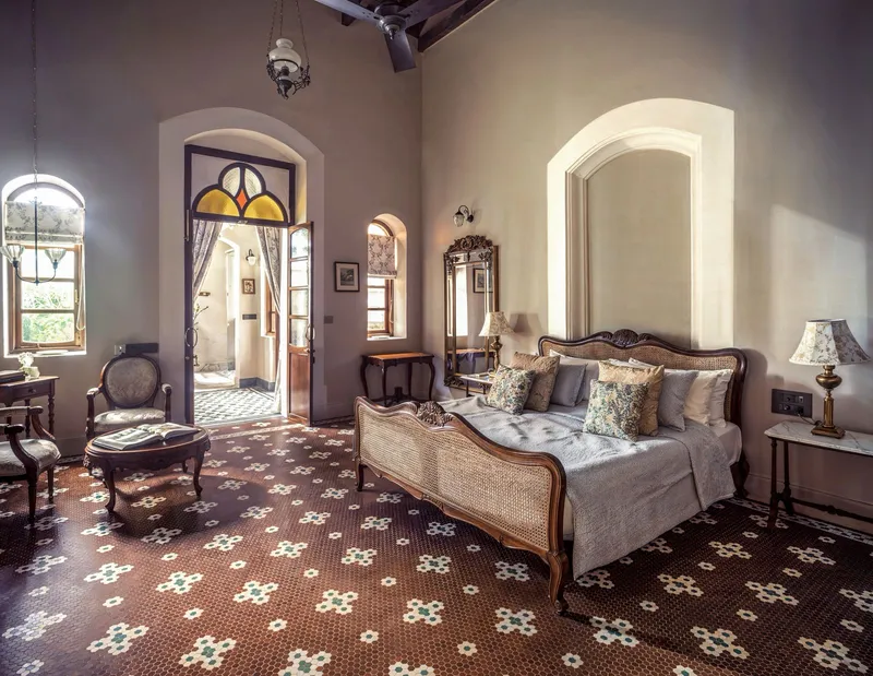 A bespoke bed customised to fit in the Parisian charm of the room