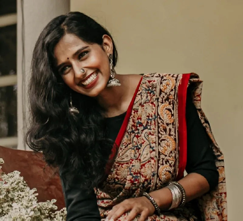 A photoshoot at a Portuguese house, in a Kalamkari saree with indian aesthetics .