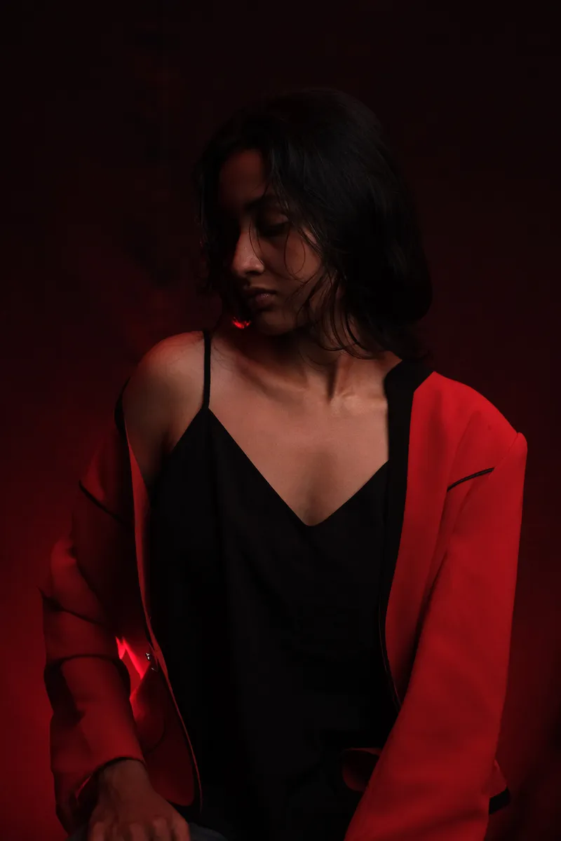 Ayesha posing during a photoshoot shot for a close up angle.JPG