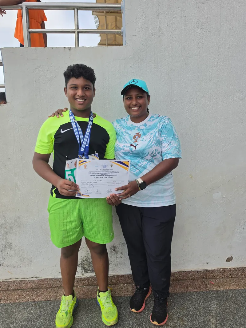 Carl Mendes with his coach Desiree