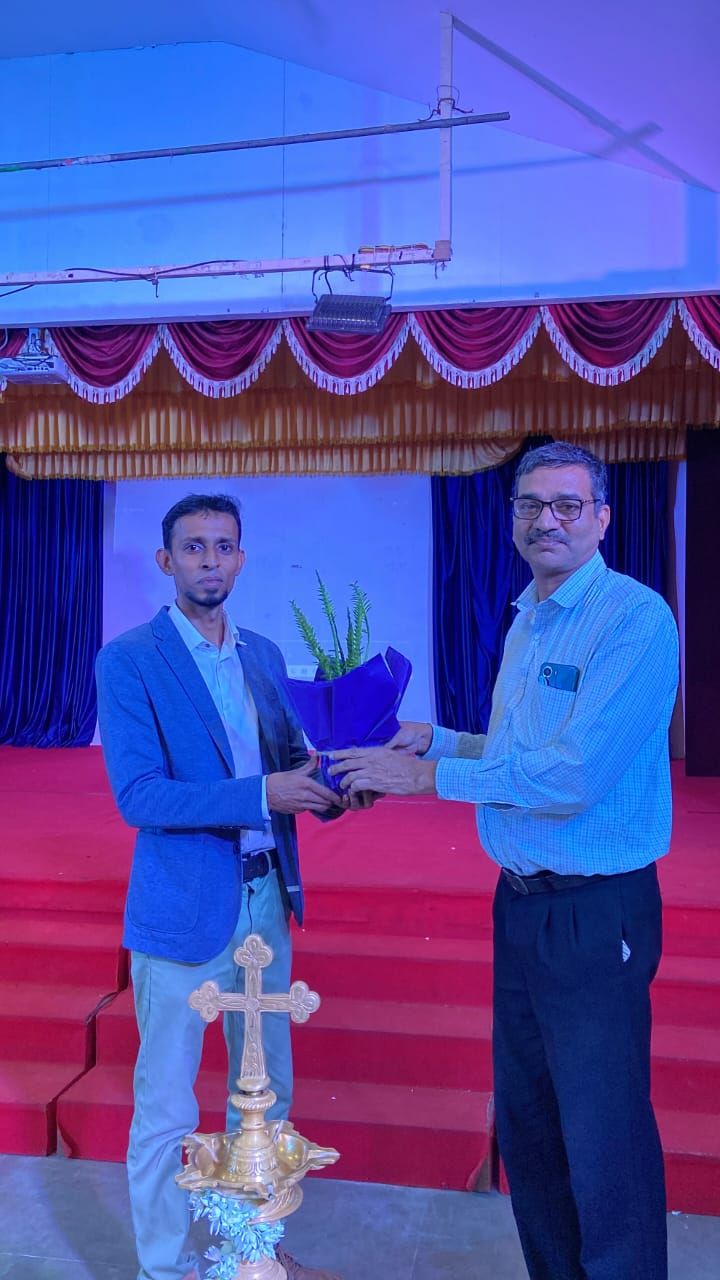 College principal, Dr Cedric Silveira felicitating the guest speaker Ferdin Sylvester