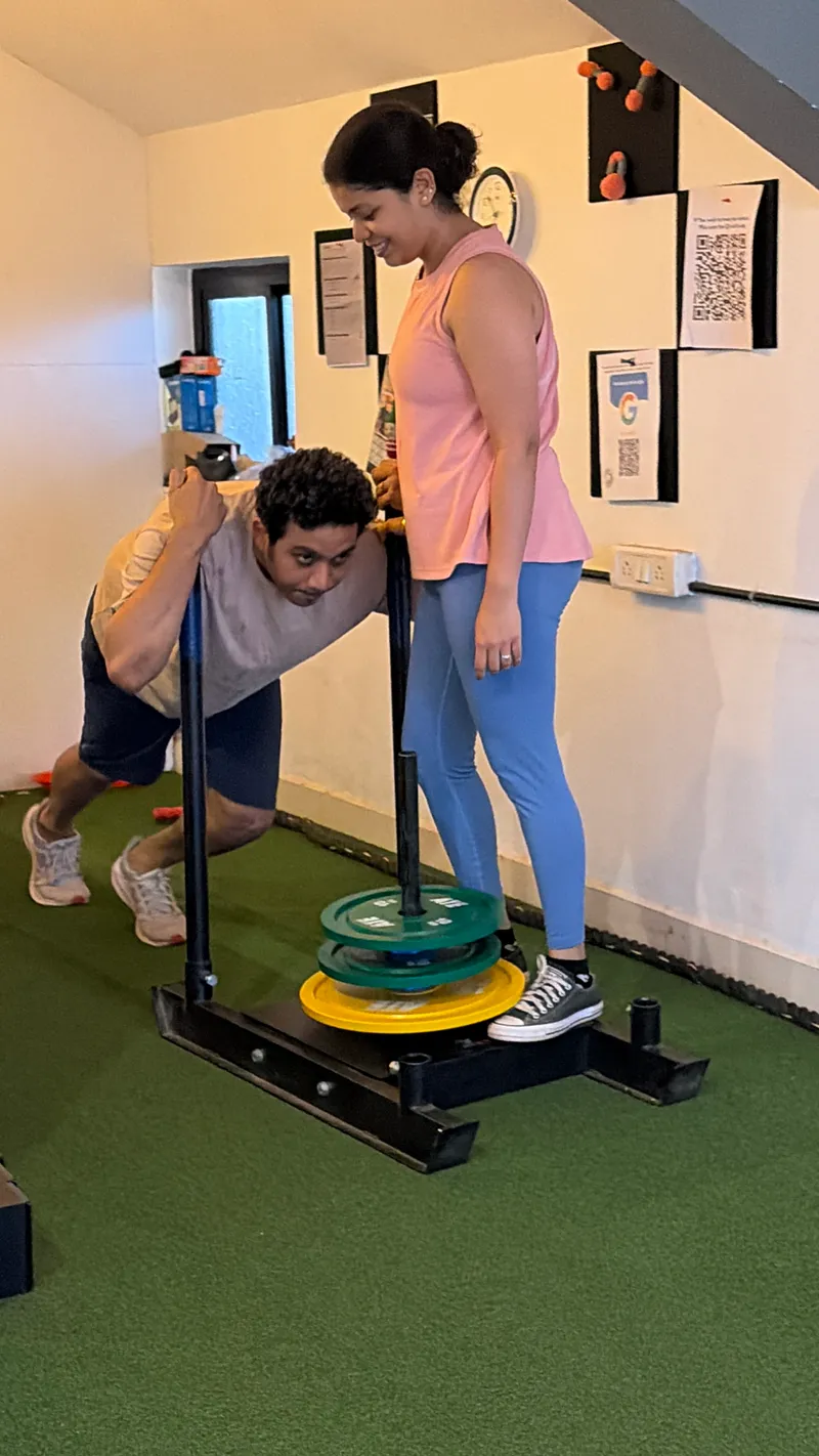 Couple doing Sled Push 2