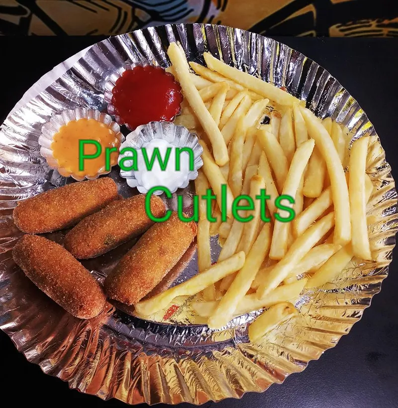 Eats prawn croquets