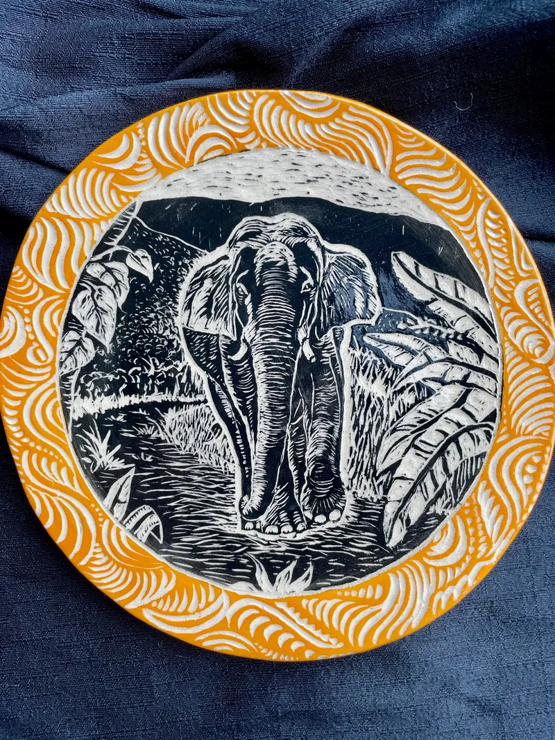 Elephant sgraffito plate