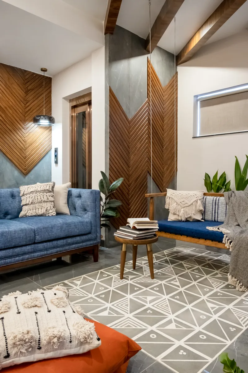 Family room dazzles with striking wall cladding and chic tiles blending bold design with elegant finishes