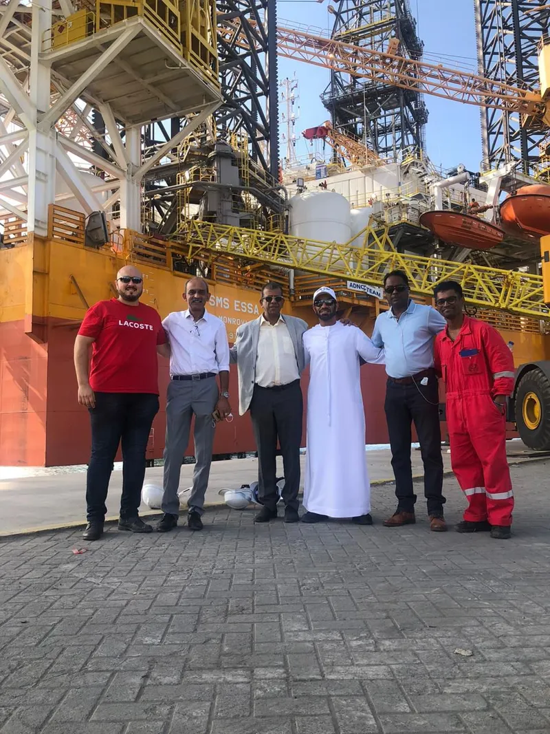 Hubert with his team (second from left) after successfully delivering SMS ESSA for ADNOC contract
