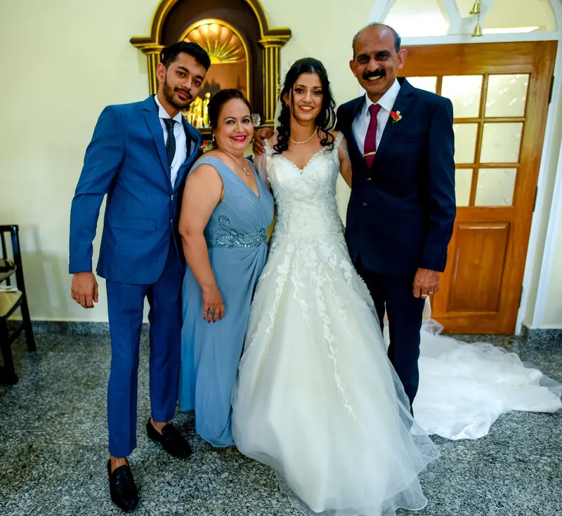 Hubert's family at his daughter Liza's wedding_ Left - Lenin, Second left - wife Ivone, Liza and Hubert