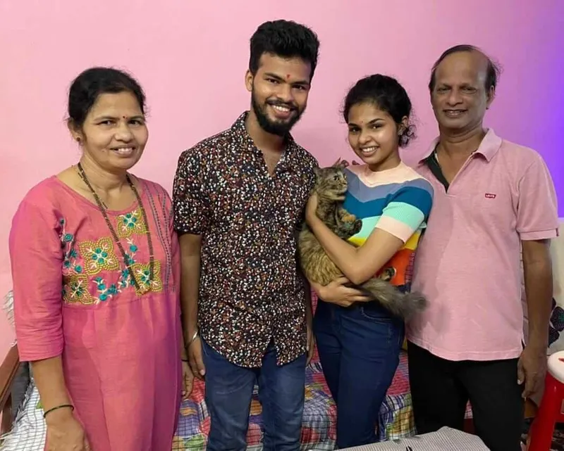 Riya Gauns with her mother, brother, and father