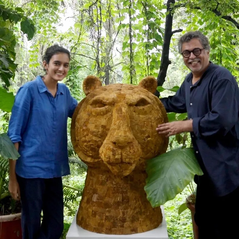 (L-R) Museum of Goa operational head Sharada Kerkar and her father, artist Dr. Subodh Kerkar, pose with the latter’s latest creation, a tiger bust sculpted from wild mushrooms (1)