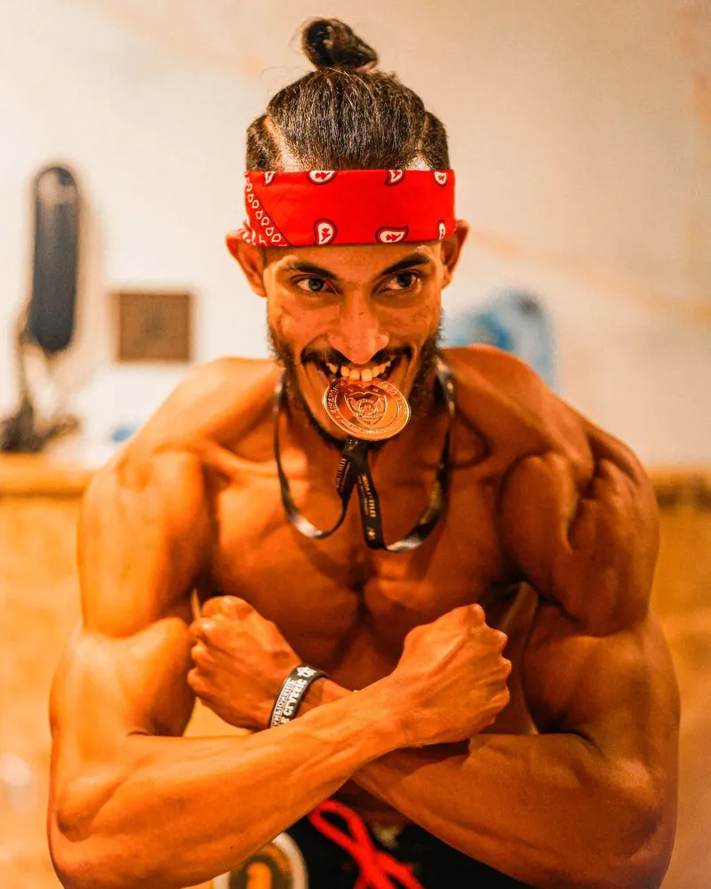 Melbern winning the Men’s Physique competition in the weight category at Elite Classic Championship in Delhi