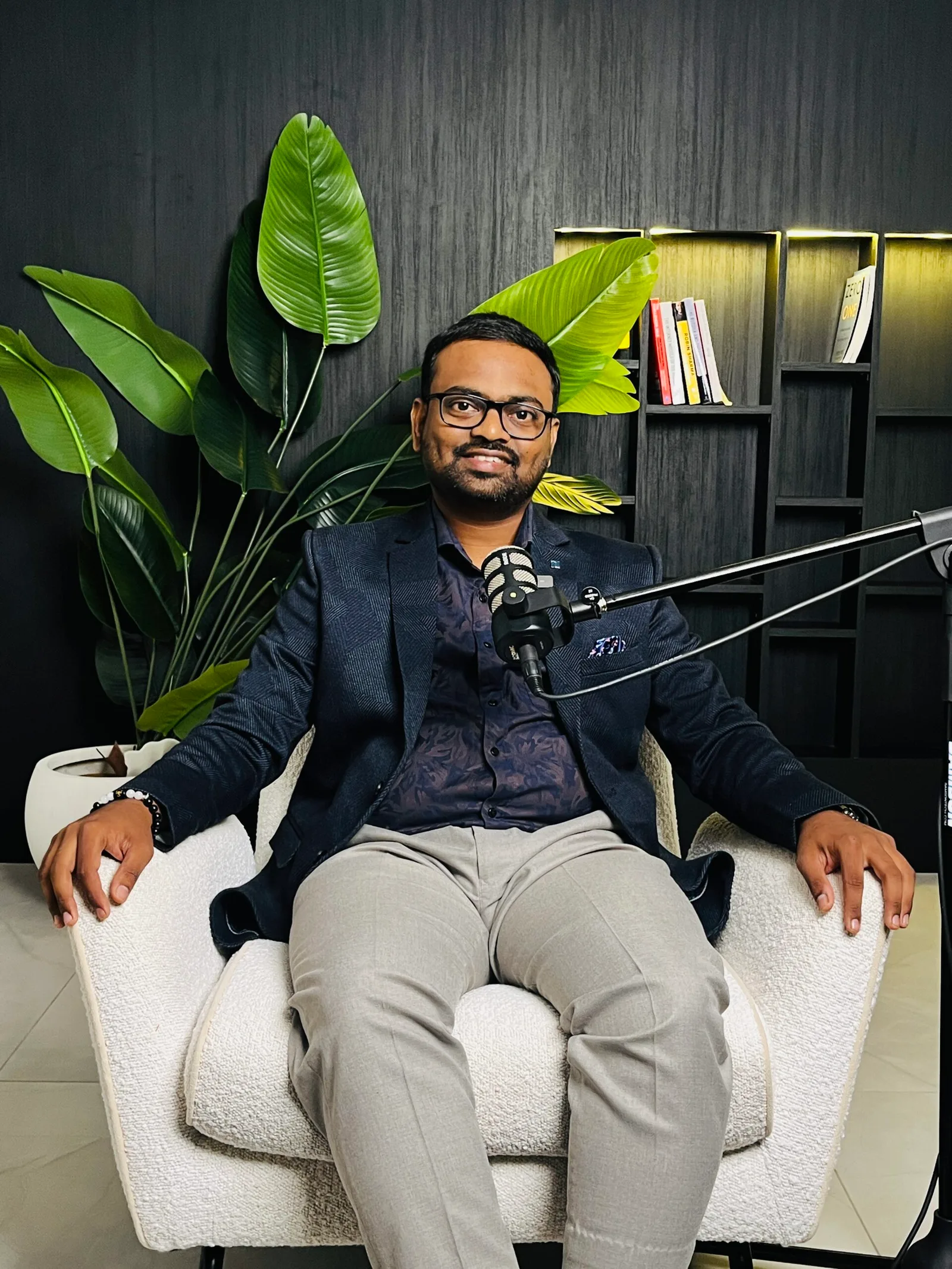 Neelai Naik at podcast studio narrating his journey in music