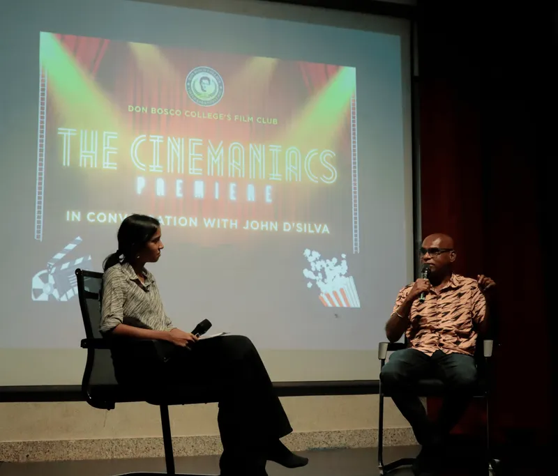 On Stage – Chief Guest John D’Silva in conversation with student moderator Varada Godkar.