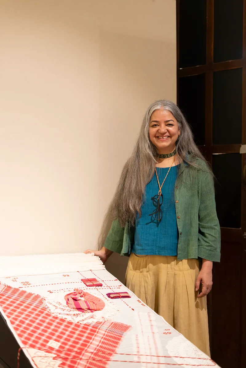 Poonam with her traditional Goan weaves collage exhibit at the Goa Open Arts Festival 2026 1