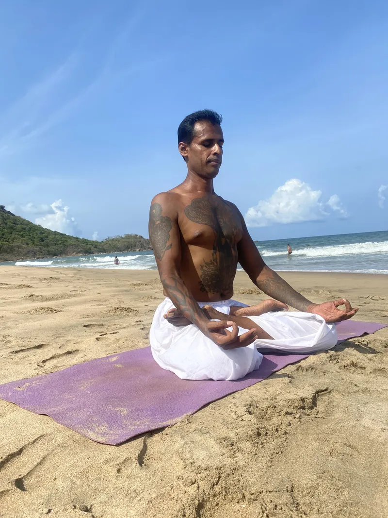 Praveen ji meditating on the beach