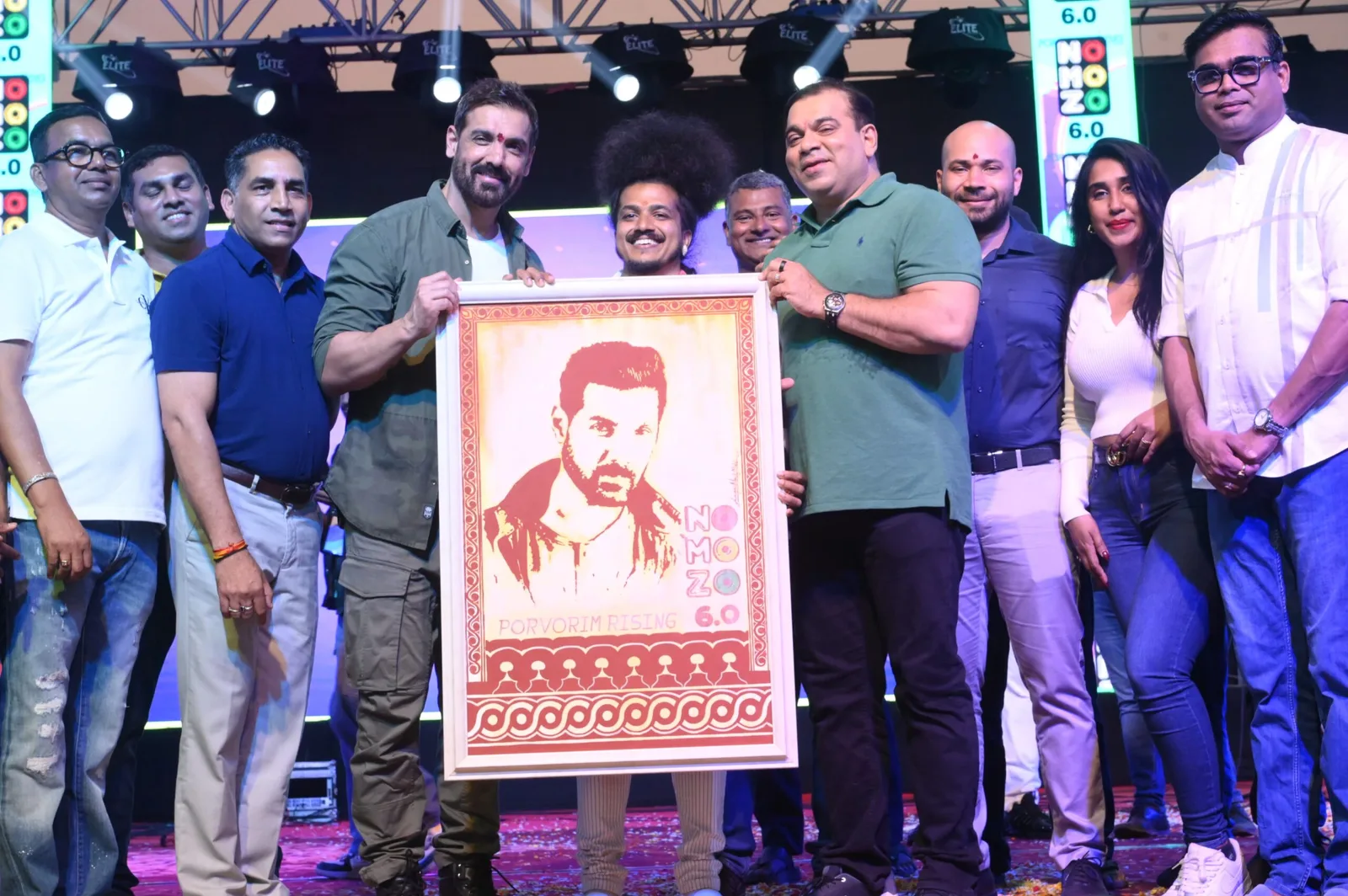 Sagar Mule presenting his work to actor John Abraham
