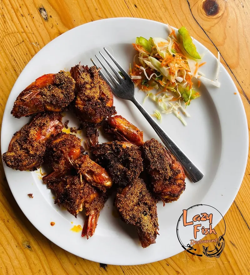 Savor the crispy, golden goodness of Rawa Fry Prawns at Lazy Fish Goa – where every bite takes you straig...30pm -4.30 pm(Open only during lunch hours[Goa, Goan, Goan Life, Goan Cuisine, Goan food, Fish Curry Ric