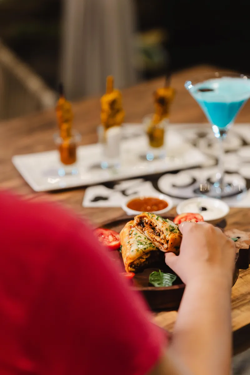 Savour the perfect pairing Delicious bar snacks and craft cocktails. 1