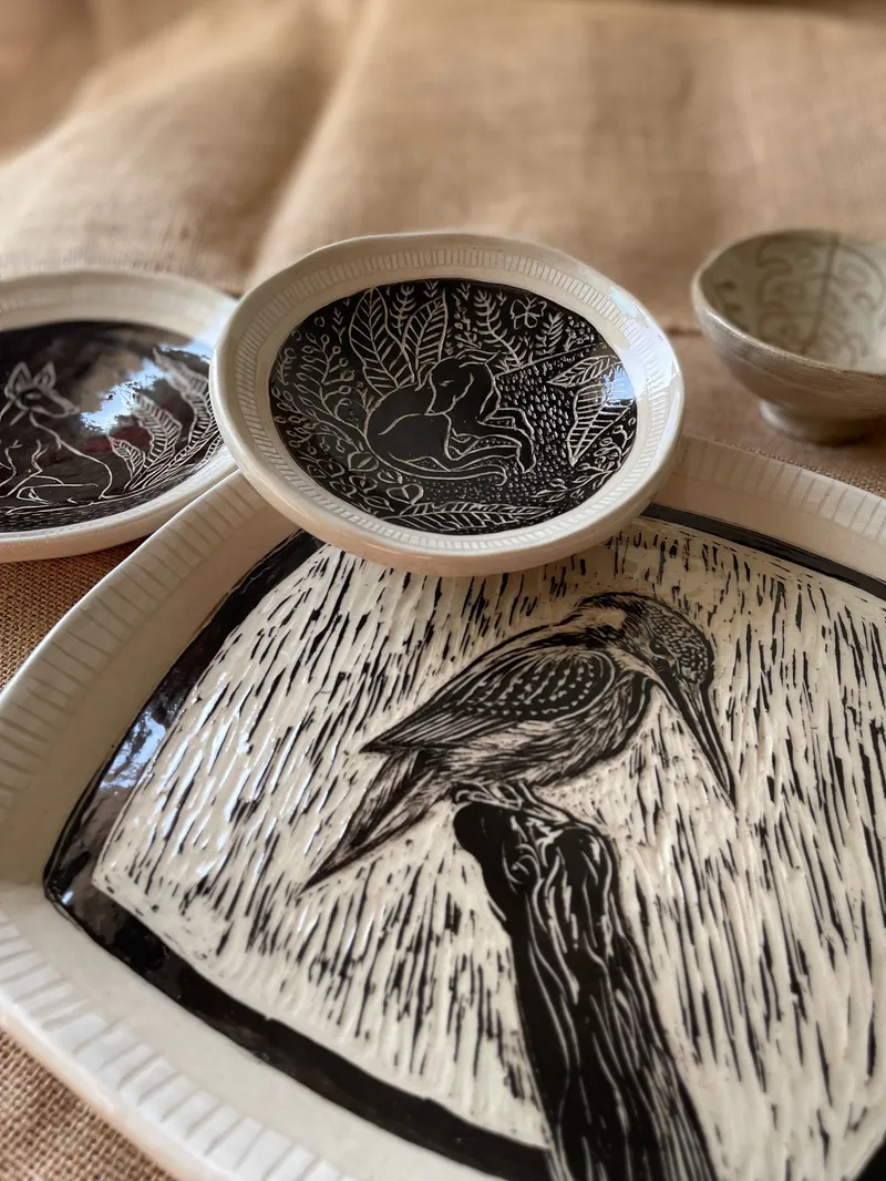 Sgraffito platter and small plates