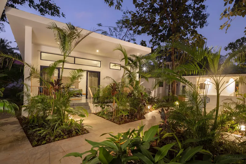 Soft evening light across lush courtyards 1