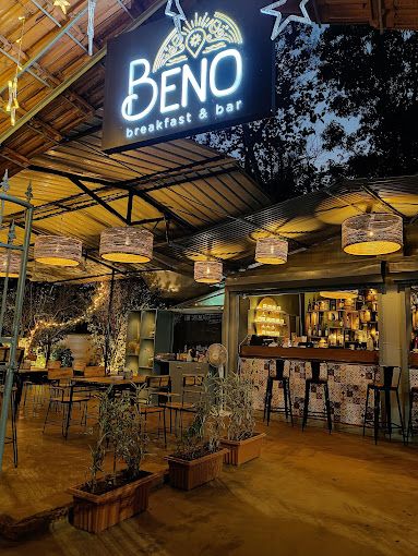 The-entrance-of-BENO-the-eclectic-breakfast-cafe-to-bar-in-Benaulim-exudes-a-warm-and-inviting-glow-1