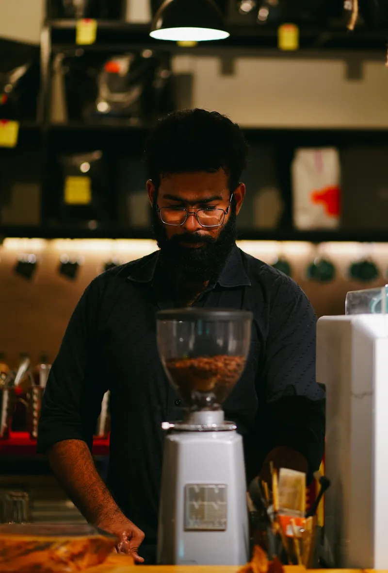 This-is-Srijith.he-manages-Logistics-and-Project-Management-for-us.he-is-a-trained-barista-as-well.an-all-rounder-of-the-rubys-team
