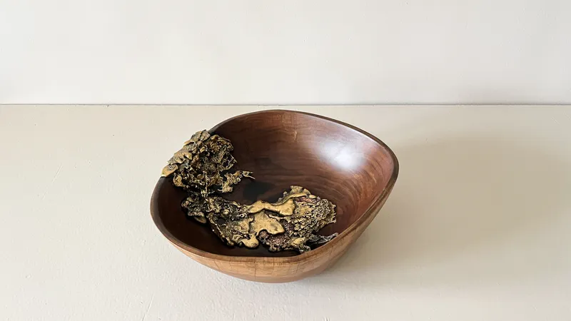 Tide a gap filled with molten brass resembling the sea