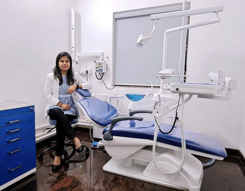 Where passion meets profession creating smiles that last a lifetime Dr Hema with her Dental chair 1