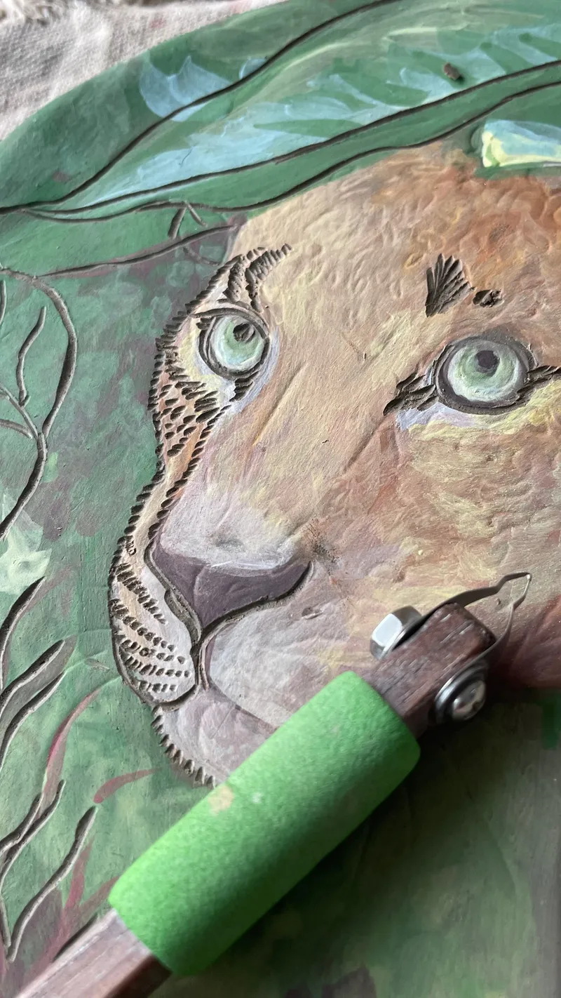 Work in progress pf painted and carved leopard plate