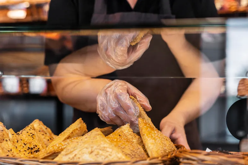 close up pastry chef preparing food