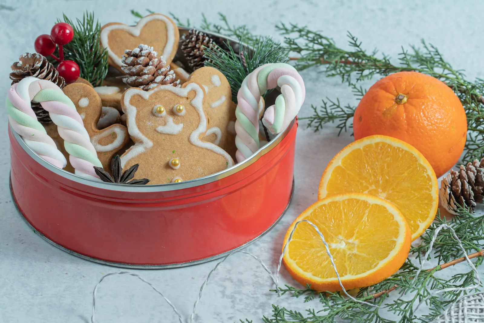 Crockery full with Homemade Christmas cookies and orange slices